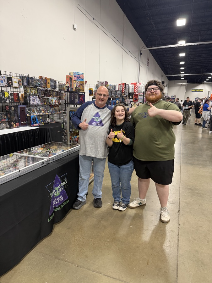 Comic shop vendors with fans